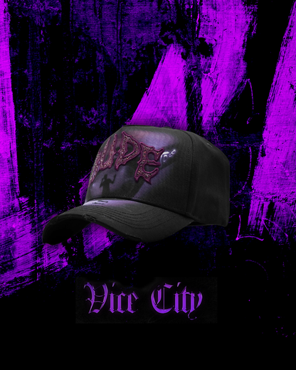 Tombochio x Rude Awakenings - Gorra Vice City + Lentes “Vice City”